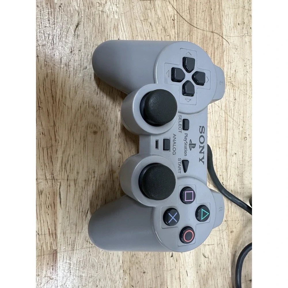 Sony PlayStation Console with DualShock Controllers Cables 4 Games SCPH-7501